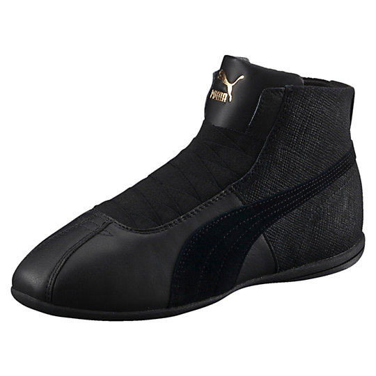 Кроссовки Eskiva Mid Remaster Wns Кроссовки Eskiva Mid Remaster WnsКроссовки и кеды<br>Кроссовки Eskiva Mid Remaster Wns<br>Ботинки для бокса PUMA Gong впервые появились на рынке в 60-е годы, их носила обладательница золотой медали Олимпийских игр 1972 года, которые проходили в Мюнхене. Вдохновленная экспрессивной энергетикой ринга, PUMA создает новую коллекцию Eskiva, объединяя мир бокса с миром моды. Новая модель Eskiva Mid сохранила изящный гибкий силуэт, а также способность повторять форму стопы и подстраиваться к движениям своего обладателя.<br><br>Коллекция: Осень-зима 2016<br>Материал верха: Кожа и замша<br>Материал подошвы: Резина<br>Средняя высота<br>Конструкция slip-in и эластичный ремешок на застежке<br>Застежка-молния с внутренней стороны<br>Петля на пятке для удобного надевания и снимания<br>Декоративный элемент в виде боксерских бинтов<br>Страна-производитель: Тайвань<br><br><br>size RU: 36.5<br>gender: Female