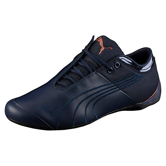 Кроссовки Future Cat M1 Citi Кроссовки Future Cat M1 CitiКроссовки и кеды<br>Кроссовки Future Cat M1 Citi<br>Фирменная модель Future Cat M1 Citi - классика среди элегантных силуэтов Puma для автоспорта. Верх из натуральной мягкой кожи высокого качества с ассиметричной шнуровкой идеально садится по ноге, а скругленная пятка необыкновенно удобна при вождении автомобиля.<br><br>Коллекция: Осень-зима 2016<br>Материал верха: Кожа<br>Асимметричная шнуровка обеспечивает оптимальную посадку<br>Закругленная пятка для комфортного вождения<br>Тонкая подошва улучшает ощущение поверхности<br>Страна-производитель: Тайвань<br><br><br>size RU: 39.5<br>gender: Male