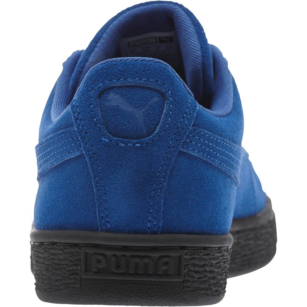 black suede pumas with brown sole