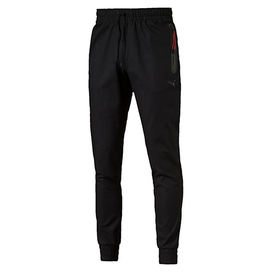 Брюки Ferrari Joggers Брюки Ferrari JoggersБрюки<br>Брюки Ferrari Joggers<br>Стильные брюки Ferrari Joggers с манжетами на щиколотках и символикой Ferrari зарядят вас энергией и вы всегда будете готовы к приключениям.<br><br>Коллекция: Осень-зима 2016<br>Состав: 98% хлопок, 2% эластан<br>Эластичный пояс с затягивающимся шнурком<br>Два кармана на молнии<br>Задний карман<br>Манжеты на щиколотках<br>Логотип PUMA с силуэтом пумы на левом бедре<br>Логотип Ferrari в виде щита на правом бедре<br>Страна-производитель: Тайвань<br><br><br>size RU: 42-44<br>gender: Male
