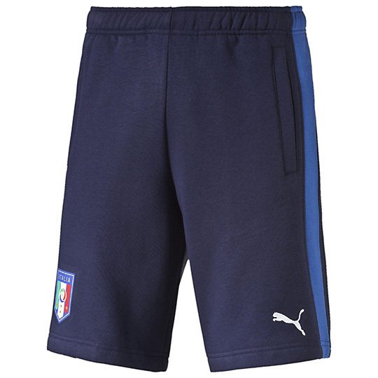 Шорты FIGC Italia Fanwear Bermudas Шорты FIGC Italia Fanwear BermudasШорты<br>Шорты FIGC Italia Fanwear Bermudas <br> Шорты FIGC Italia Fanwear Bermudas созданы для специализированной итальянской коллекции Puma, специально для фанатов итальянского футбола и его традиций. Приобщитесь к семье поклонников любимой футбольной команды вместе с этими легкими и комфортными шортами, изготовленными по итальянским лекалам из ткани с высоким содержанием хлопка. Эти шорты станут удобной одеждой для тренировок и повседневной жизни, а яркие принты с логотипами расскажут окружающим о ваших предпочтения в спорте и о вашем великолепном вкусе. <br> <br>Коллекция: Весна-лето 2016 года.<br>Официальная графическая эмблема FIGC;<br>Логотип PUMA;<br>Итальянский фасон.<br>Материал: 70% хлопок 30% полиэстер.<br><br><br>size RU: 48-50<br>gender: Male