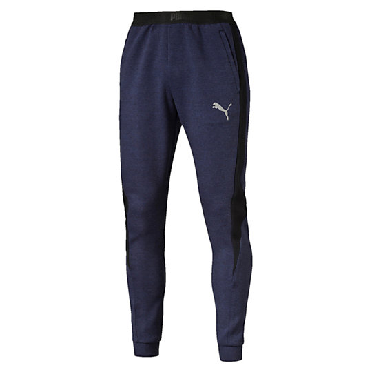 Брюки Evostripe Proknit Pants Брюки Evostripe Proknit PantsБрюки и леггинсы<br>Брюки Evostripe Proknit Pants<br>Иногда так хочется просто расслабиться и не думать о своем внешнем виде… При этом вы всегда стараетесь выглядеть хорошо. В вашем случае эти уютные, мягкие брюки со свободным кроем прекрасно дополнят спокойный наряд, а вам не придется жертвовать стилем.<br><br>Коллекция: Осень-зима 2016<br>Состав: 77% хлопок, 23% полиэстер; двухсторонний трикотажЦвета: черный, синий<br>Эластичный пояс с символикой PUMA<br>Два кармана на молнии<br>Боковые панели PUMA Formstrip<br>Светоотражающий логотип PUMA в виде силуэта пумы на груди слева<br>Страна-производитель: Китай<br><br><br>size RU: 46-48<br>gender: Male